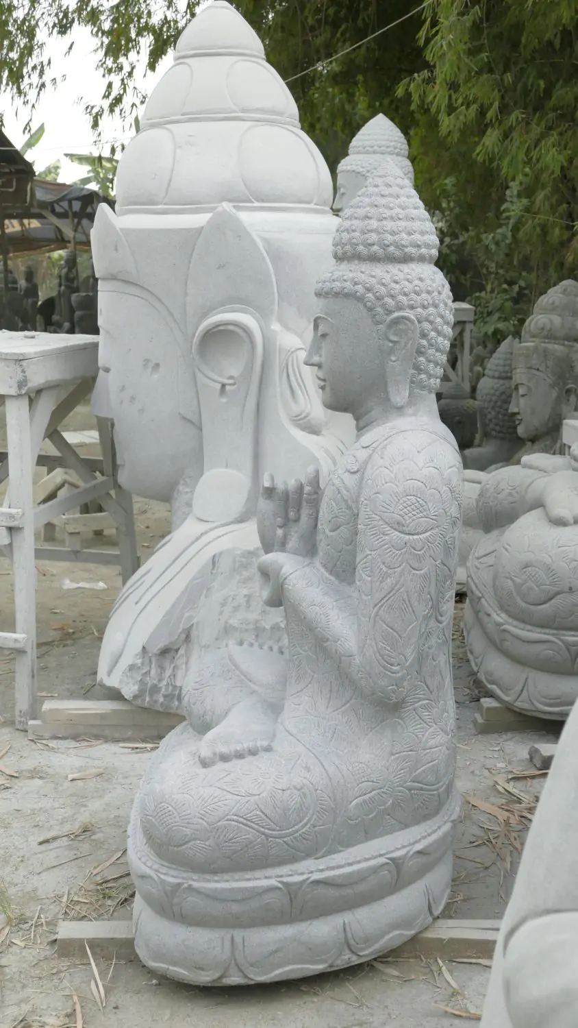  Product image 6 of the product “Seated Buddha with floral carving -Chakra position. About 152cm height. Natural stone (river stone), stonemasonry ”